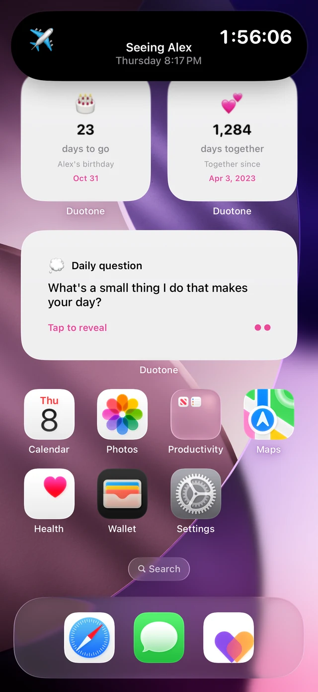 A live countdown in the Dynamic Island above Duotone widgets on an iPhone Home Screen